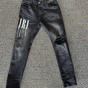 AMIRI Black Skinny Jeans with Graphic Detail